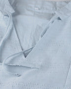 ER | Miniabito dalla linea ariosa con scollo a V, maniche a 3/4 e tasche