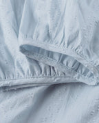 ER | Miniabito dalla linea ariosa con scollo a V, maniche a 3/4 e tasche