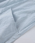 ER | Miniabito dalla linea ariosa con scollo a V, maniche a 3/4 e tasche