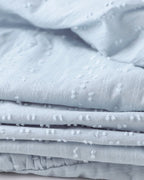 ER | Miniabito dalla linea ariosa con scollo a V, maniche a 3/4 e tasche