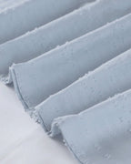 ER | Miniabito dalla linea ariosa con scollo a V, maniche a 3/4 e tasche