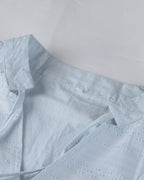 ER | Miniabito dalla linea ariosa con scollo a V, maniche a 3/4 e tasche