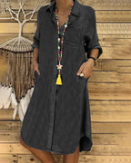 ER | Abito midi di jeans con maniche arrotolate e taschino sul petto.