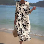 ER | Maxi abito con motivo floreale