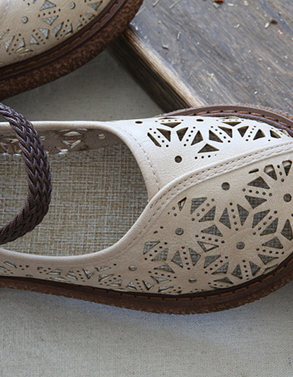 ER | Scarpe slip-on con taglio floreale