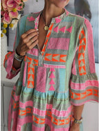 ER | Abito stampato con scollo a V